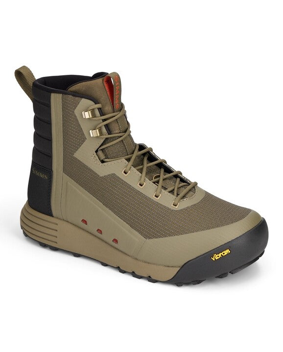 Simms Access Wading Boot in olive green and black with high ankle support, durable mesh and rubber sole featuring Vibram traction for reliable grip in wet fishing environments.