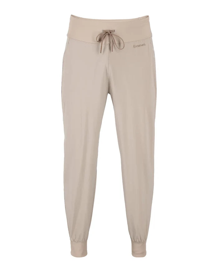 Beige Simms BugStopper Joggers - Women's featuring a drawstring waist, side pockets, elasticized cuffs, and lightweight fabric suitable for fishing and outdoor activities.