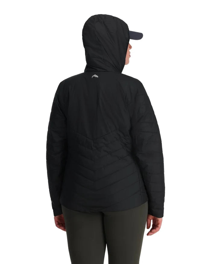 Back view of a woman wearing a black insulated jacket with a hood and a cap, shown with the Simms Fall Run Hoody Smokey Olive - Women's, designed for outdoor fishing activities.