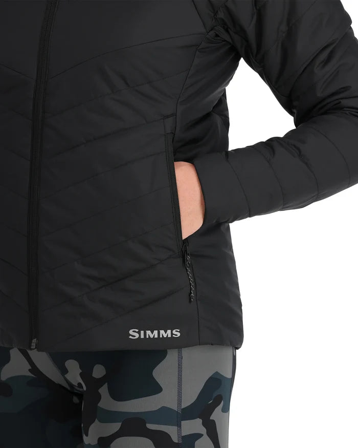 Close-up of a black insulated jacket with hand in zippered pocket, featuring the Simms logo, part of the Simms Fall Run Hoody Smokey Olive - Women's designed for outdoor fishing activities.