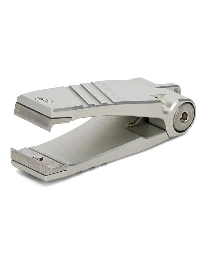 Simms Guide Nipper featuring a compact, silver metallic body with sharp cutting edges designed for precise trimming of fishing line and tackle.