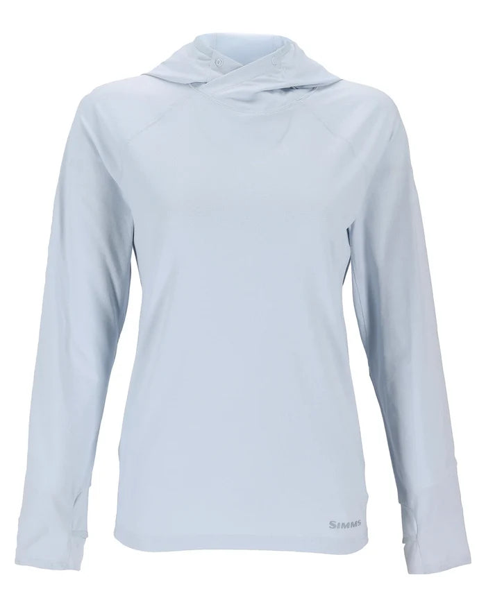 Simms Women's SolarFlex Hoody in light blue, featuring long sleeves, a lightweight hood, and moisture-wicking fabric designed for sun protection and comfort during outdoor fishing activities.