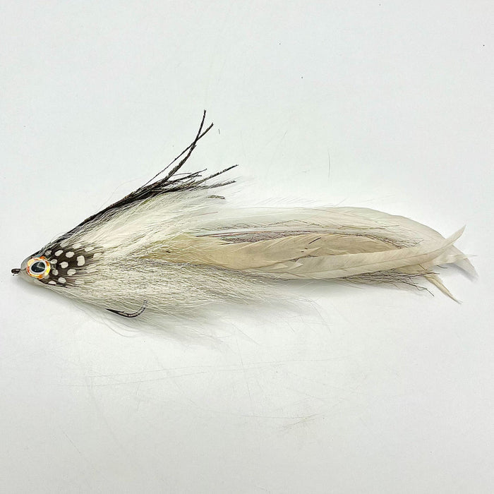 Single Minnow Urban Fly Co. fishing lure with white and black feathers, detailed eyes, and a hook designed for musky and fly fishing tackle.
