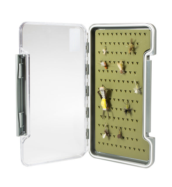 Open South Fork Silicone Slim Fly Box showing multiple artificial fishing flies neatly secured inside a slim, olive green foam interior with a clear plastic lid and gray outer frame.