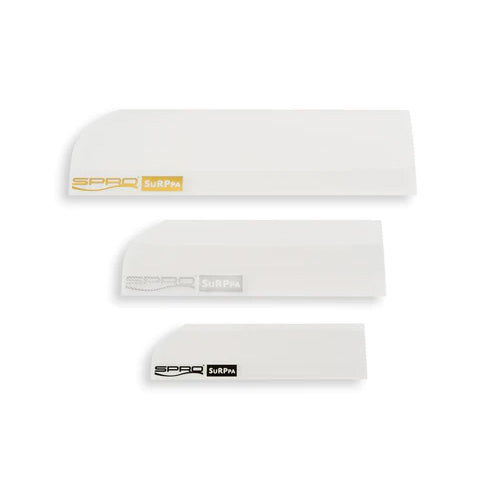 SPRO x Surppa Lure Holder set featuring three white, rectangular silicone pieces in varying sizes designed to protect fishing lures during transport and storage.