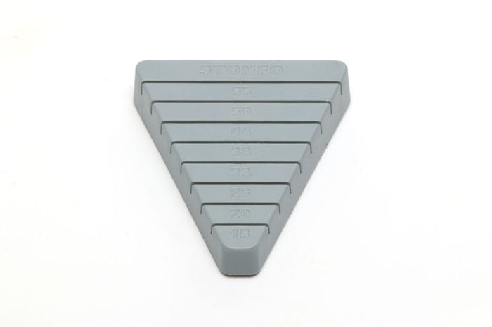 Stonfo CDC Feathers Block, a gray triangular tool with multiple slots for securely holding and organizing feathers when creating fishing lures and tackle.