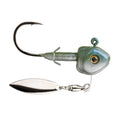 Close-up of a Strike King Tour Grade Fluorospin Underspin fishing lure featuring a sharp black hook, green and silver weighted head with a realistic eye, and a reflective silver spinner blade for attracting fish.