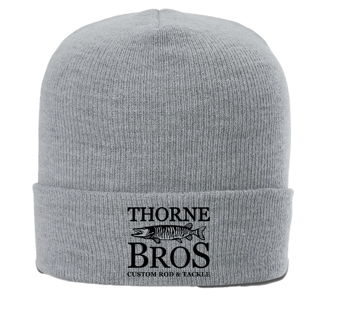Thorne Bros Logo Cuff Beanie in light gray knit fabric featuring a black embroidered logo with a fish design, ideal for outdoor fishing enthusiasts.