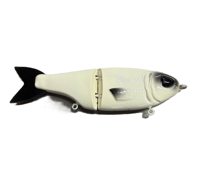 Throwback Swimbaits Minne Glide fishing lure designed to mimic a small fish with a jointed body and realistic textured scales for effective fishing tackle use.