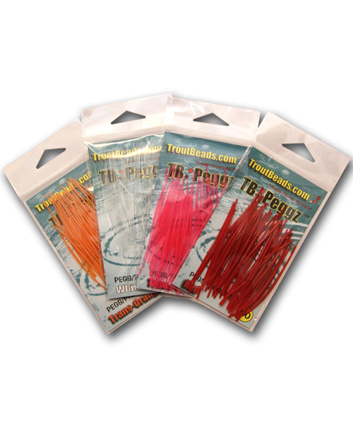 Five clear plastic packages of Troutbeads Peggz fishing lures in various colors including orange, white, pink, and red, designed for fishing tackle use.