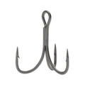 Close-up of a VMC RedLine Series Finesse Treble fishing hook with three sharp, barbed points and a looped eye for attaching to fishing lures or tackle.